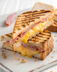 Delicious Grilled ham and cheese sandwich, on isolated white background