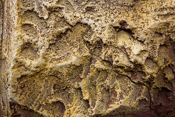 Grainy Textured Artificial Rock Made of Cement and Sand with Realistic Gold Paint Finish - Abstract Grunge Decorative Relief Backgrounds