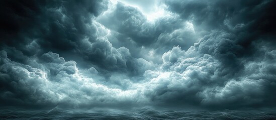 Dramatic grey sky filled with tumultuous clouds creating a moody atmospheric landscape perfect for weather-related themes