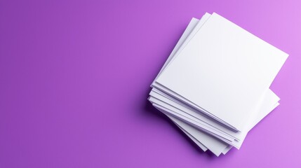 Fototapeta premium Stack of Blank White Paper on Purple Background