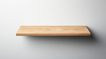 Simple wooden shelf against a minimalistic wall, ideal for decoration or storage.