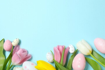 Colorful eggs with tulip flowers on a color background, space for your text or advertising. Happy Easter