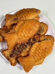 Bungeoppang, bungeo-ppang (Korean Fish Shaped Pastry), popular snack, cookies, sweet in winter streets of Korea. Bungeoppang (붕어빵) - Korean traditional national food, dish, cuisine. Japanese taiyaki
