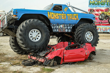 Huge Monster Truck climbs, crushes and completely destroys a demo car