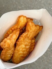 Bungeoppang, bungeo-ppang (Korean Fish Shaped Pastry), popular snack, cookies, sweet in winter streets of Korea. Bungeoppang (붕어빵) - Korean traditional national food, dish, cuisine. Japanese taiyaki
