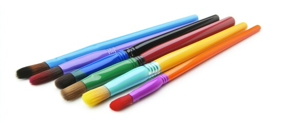Fototapeta premium Colorful paintbrushes arranged neatly on a white background showcasing various sizes and styles for creative art projects and painting.
