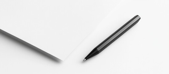 Close up of a blank white notepaper and a black pen on a minimalist white background for creative writing or note-taking concepts
