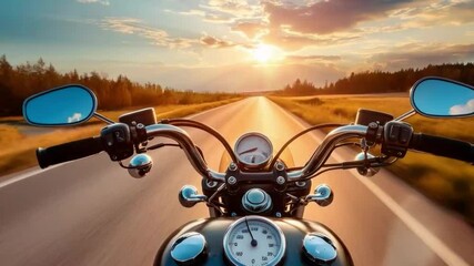 A video of a view of the road from the handlebars of a motorbike at sunset would make a great backdrop for travel, freedom, adventure videos.
