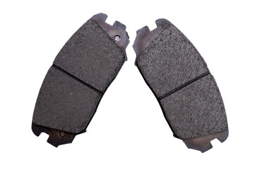 Isolated two brake pads on white background. Auto parts replacement concept, car maintenance.