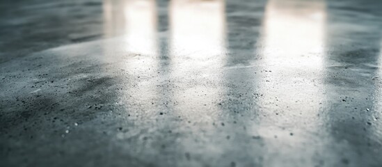 Polished concrete floor texture reflecting light for modern interior design backgrounds and architectural presentations