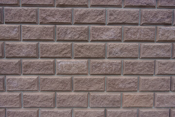 pinkish brown split face brickwork with stretcher bond pattern texture