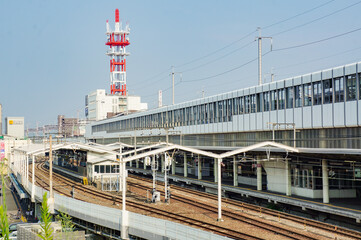Fototapeta premium 福山駅の鉄道と都市風景