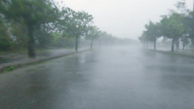 Driving In Sheets Of Rain And Strong Wind As Hurricane Hits - Khanun