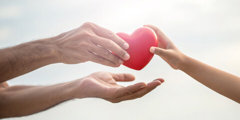 Abstract background. Valentine's Day Concept with Warm Family Love and Care. Red heart, hands,...