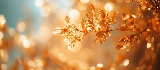 Fototapeta premium Autumn leaves in golden hues against a blurred background with ample space for text placement and creative design elements.