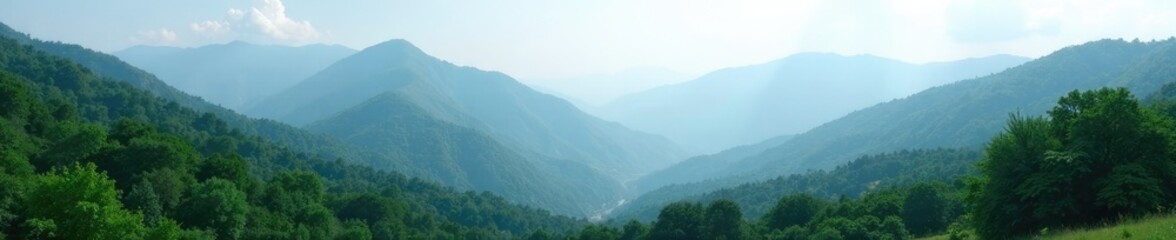 Mountain landscape with misty atmosphere and gentle slopes, green mountains, forest scenery