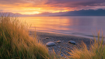 Serene Coastal Sunset Panorama with Vibrant Sky and Tranquil Waters Framed by Distant Mountains