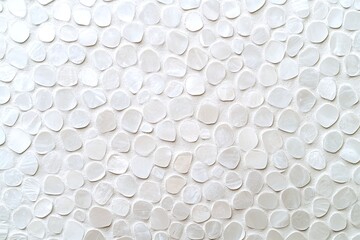 Fototapeta premium White Polished Pebble Stone Texture on Flat Background with Smooth Round Shapes and Natural Pattern