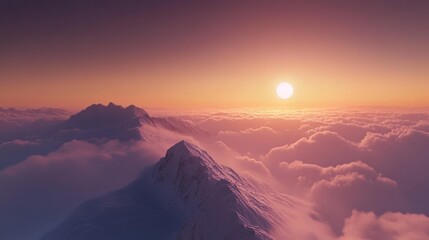 At dawn, view from the mountain peak with the emerging sun above the clouds