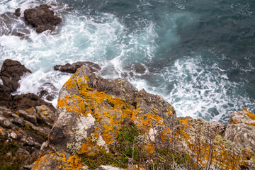 waves crashing on rocks