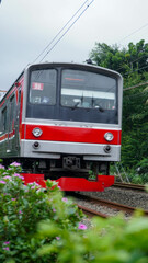 Obraz premium KRL or electric rail train or electric railcar, which is popular in Indonesia, especially serving the people of Jakarta and its surroundings