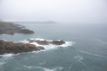 waves crashing on rocks