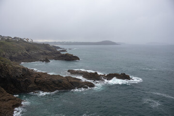 waves crashing on rocks