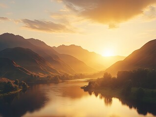 Fototapeta premium Golden hour mountain view with river reflection in warm sunset light scenery