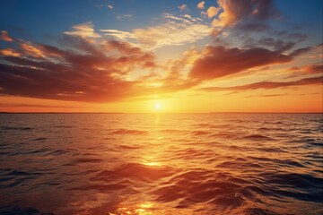 Fototapeta premium Orange Sunrise over the Ocean. Beautiful Seascape with Stunning Sun Rays and Clouds in the Morning Light