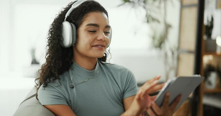 Streaming, headphones and woman with tablet, home and listening to sound with tech and subscription. Online, entertainment and person with app for movies, browsing or relax on break with social media