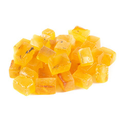 A pile of yellow cubes amber on a white background