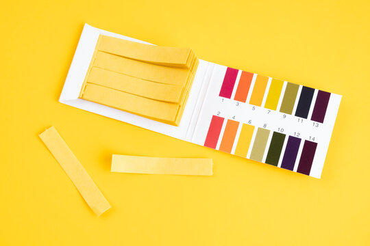 universal indicator paper with acidic testing.