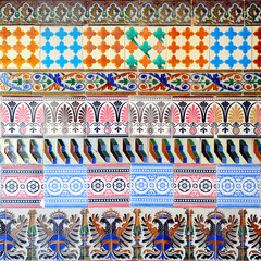 Reuse of old tiles made in Seville style for traditional decoration in architecture. Current fashion trend in interior decoration. Graphic resource of Spanish inspiration for advertising background