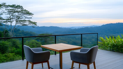 Obraz premium Outdoor dining table overlooking rainforest mountains at sunrise