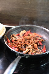food view colorful food being prepared in a pan, home cooking, peppers, chicken, onions,
