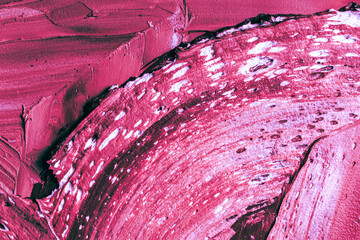 Abstract background with magenta, burgundy or wine colored plaster texture. Seamless background with large brush strokes. Rough stylized texture with space for text.