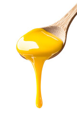 Yellow liquid, custard dripping from spoon with white background