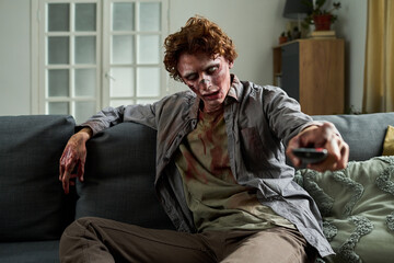 Creepy Male Zombie Choosing TV Show