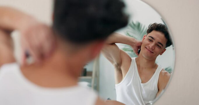 Deodorant, mirror and grooming with man in bathroom for morning routine, beauty and perfume spray. Reflection, skincare and cleaning with person at home for self care product, hygiene and cosmetics