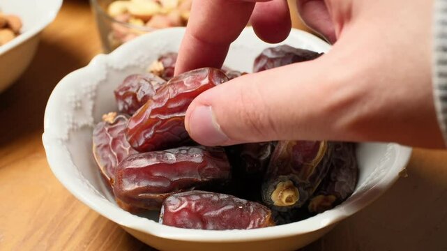 dried fresh dates on a plate macro shot

