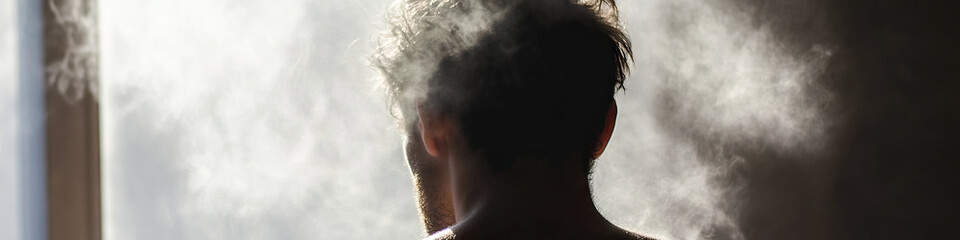 Silhouetted Man with Vaporous Background