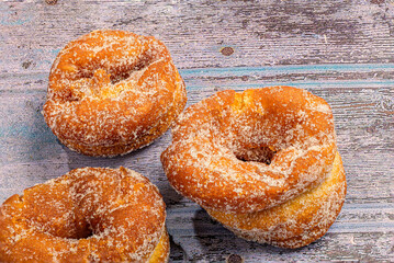 Crunchy Anise Doughnuts on Rustic Wooden Surface