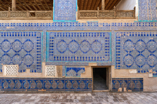 Decorated wall with blue tiles  at Tash Hauli royal palace in Ichan Kala town