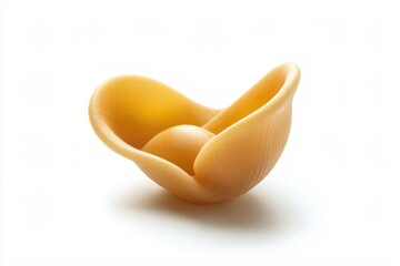 Single conchiglie pasta shell with small round pasta on white background simple and clean
