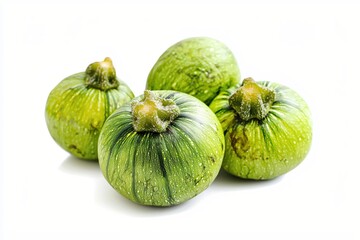 Four Round Green Zucchinis on a White Background Showcasing Freshness and Natural Texture