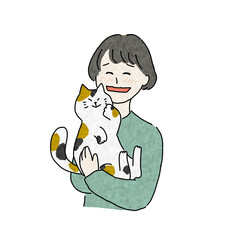 猫を抱いてデレデレする女性