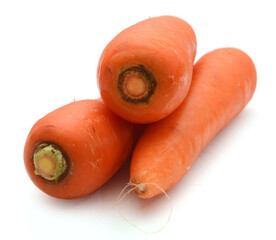 There are carrots on a white background - stock photo
