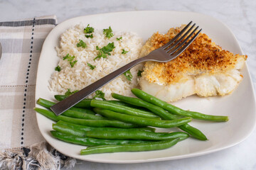 baked haddock fillet with rice and beans