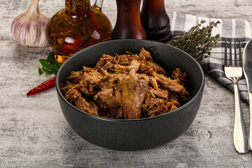 Shredded slow cooked pork meat