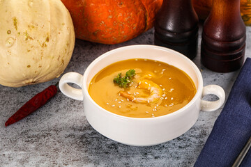 Pumpkin cream soup with prawns